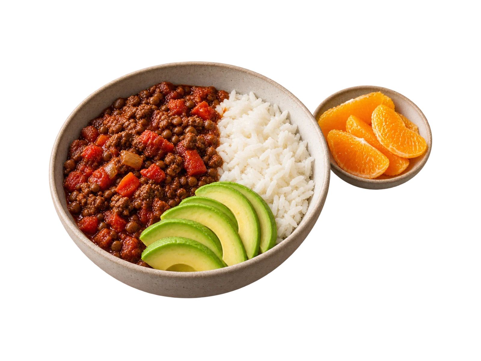 A stone bowl of beef and lentil chili beside white rice, with sliced avocado in front and orange segments on a side plate.