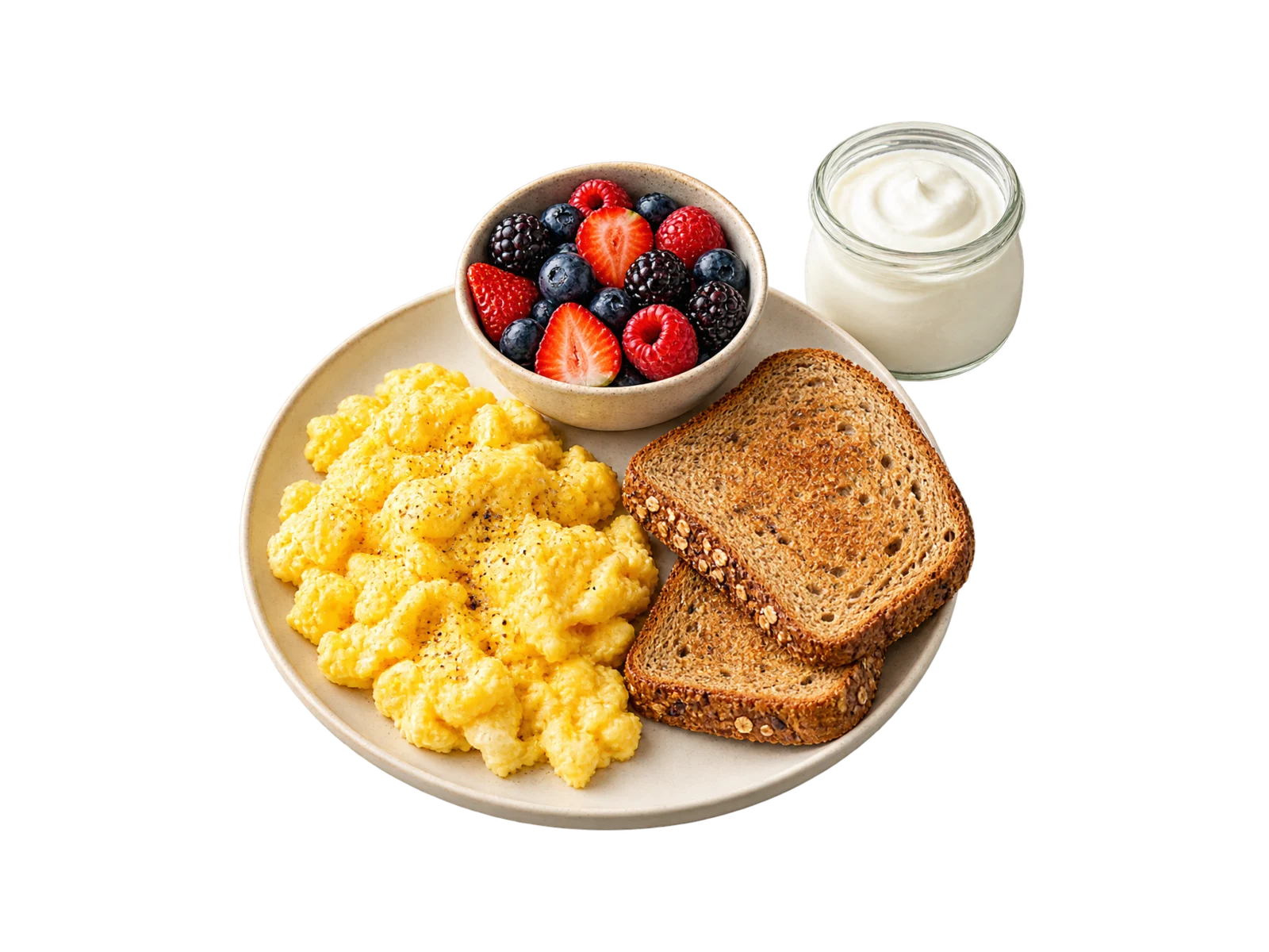 A plate of soft scrambled eggs and two slices of whole-grain toast, a bowl of mixed berries and a jar of Greek yogurt.